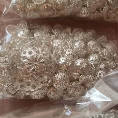 Silver filigree mariachi buttons and decorative traje accents in bulk