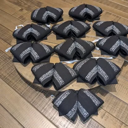 Black mariachi monos with silver embroidered design